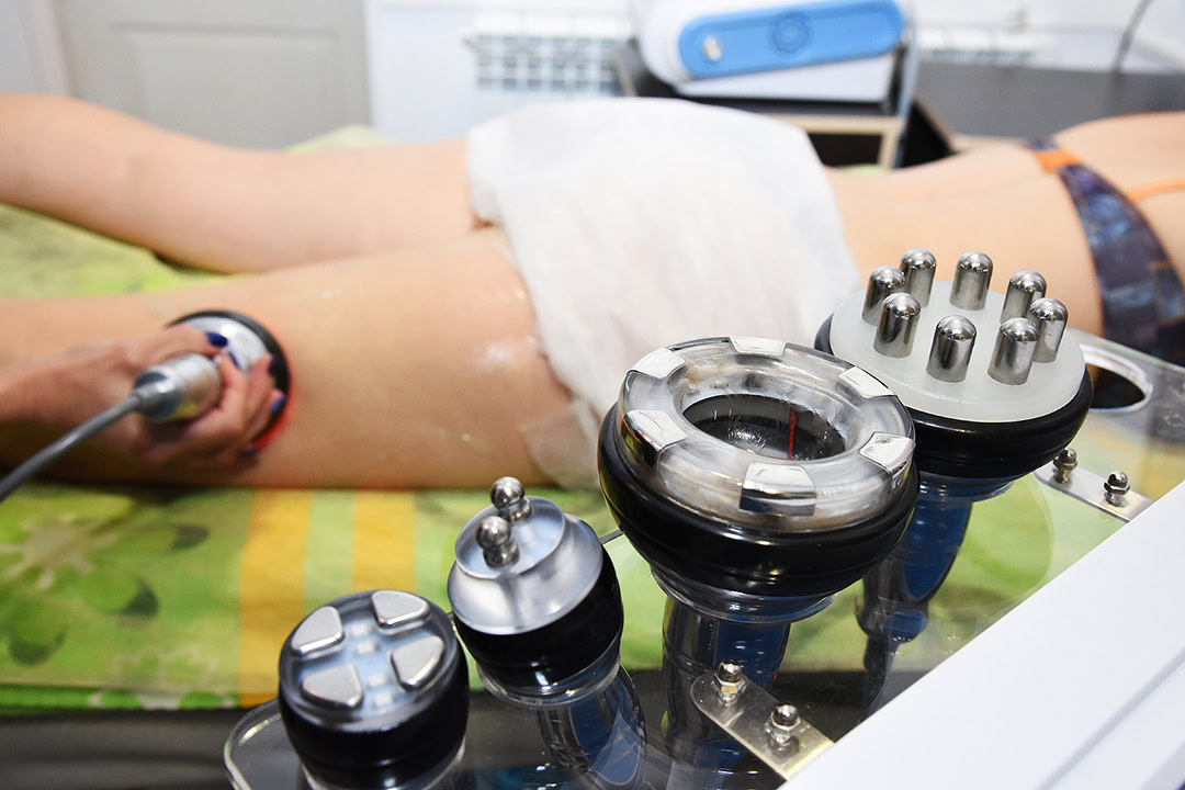 Radiofrequency (RF) device used during a non-surgical body contouring treatment at Namaste Skincare & Wellness in Las Vegas.